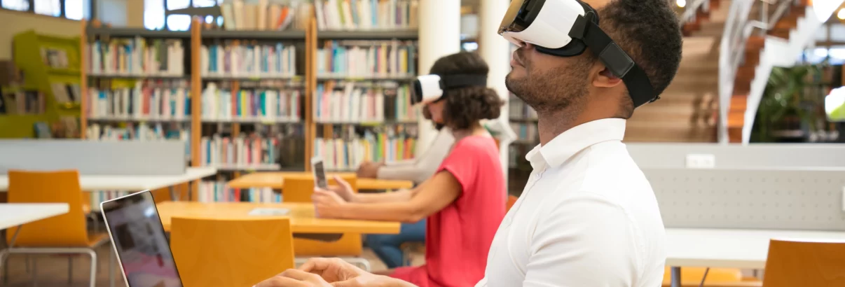 adult-male-student-with-vr-simulator-library