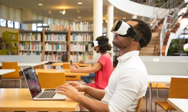 adult-male-student-with-vr-simulator-library