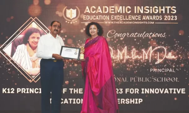 Dr. Malini Dutta receiving award image