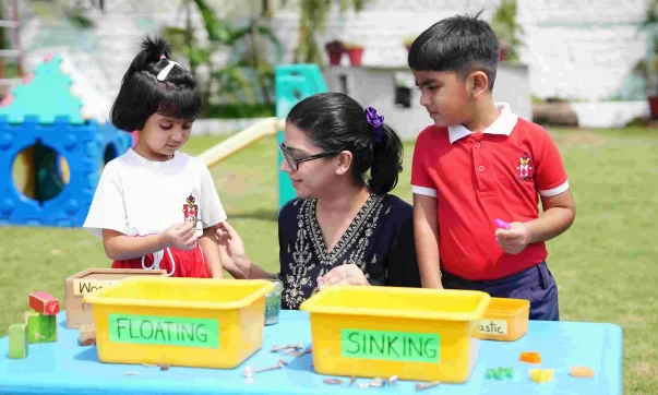 image of teacher interaction with students at Maple Bear Canadian Pre-School