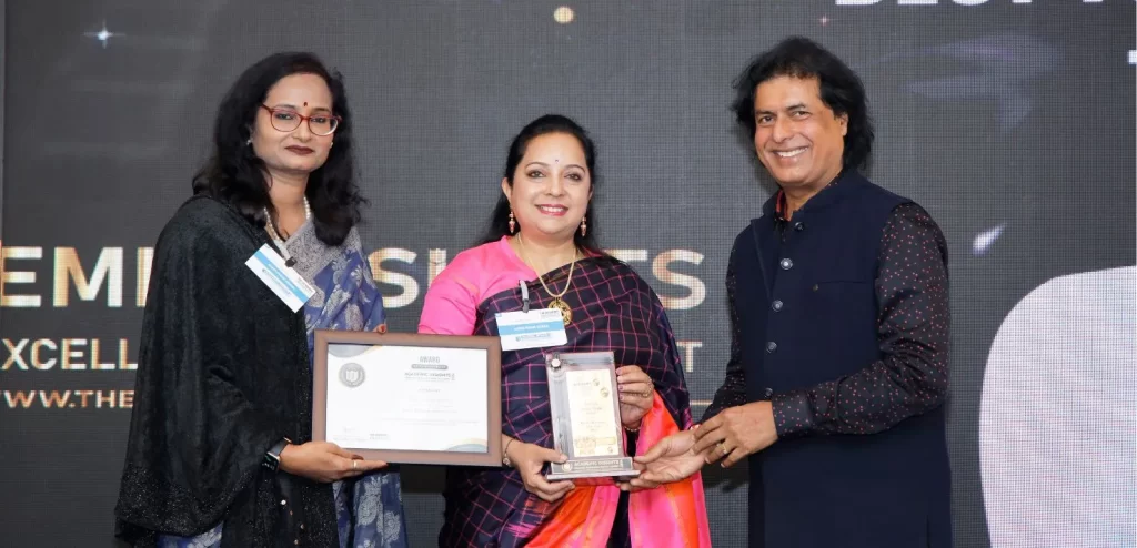 Mrs. Meena Jayachandra, Director, and Mrs. Pratima Srivastava, Principal of Auden Public School, receiving the award at the Academic Insights Education Excellence Awards and Summit 2024