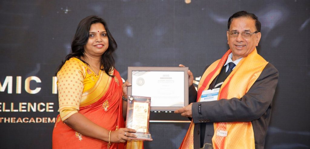 Bhawana Ranjan, the Principal of S.G.N Thikra Convent receiving 'Future Visionary Principal 2024 - Grassroots Education' award at the Academic Insights Education Excellence Awards & Summit 2024