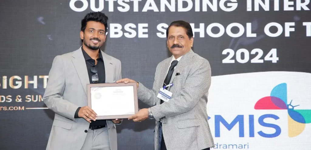 Dr. M. Vijay Chandru, the Executive Director of Chandramari International School receiving the award at the Academic Insights Education Excellence Awards & Summit 2024