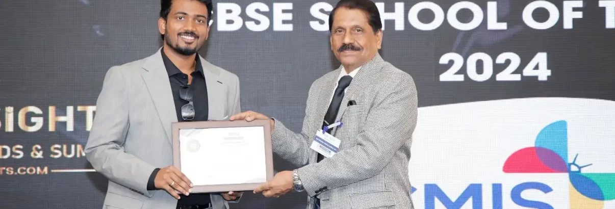 Dr. M. Vijay Chandru, the Executive Director of Chandramari International School receiving the award at the Academic Insights Education Excellence Awards & Summit 2024