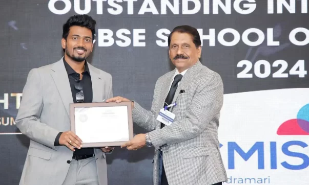 Dr. M. Vijay Chandru, the Executive Director of Chandramari International School receiving the award at the Academic Insights Education Excellence Awards & Summit 2024