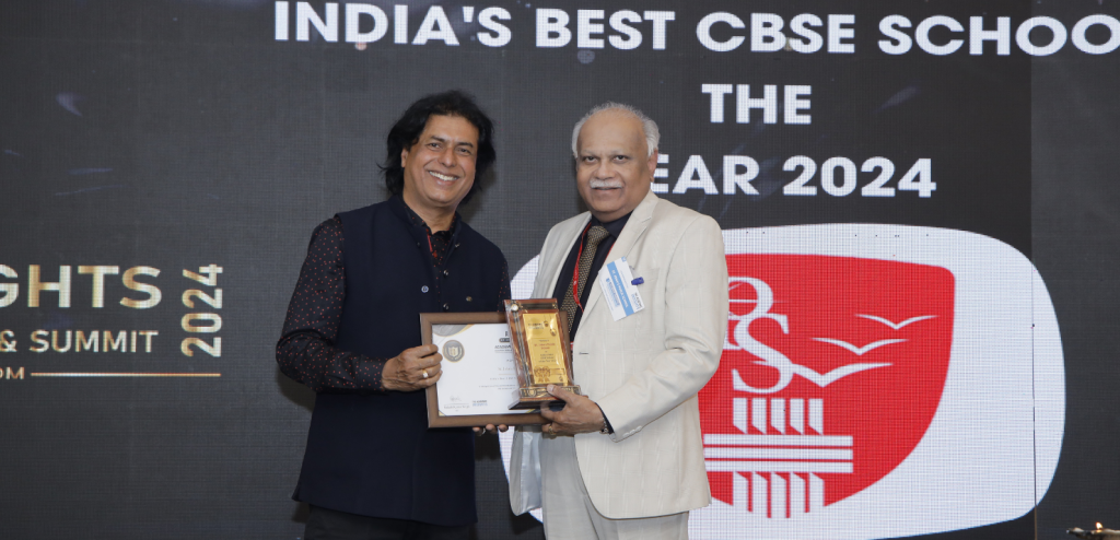 Dr. R. Kishore Kumar - Chairman of the St. John's Public School receiving the award at the Academic Insights Education Excellence Awards & Summit 2024