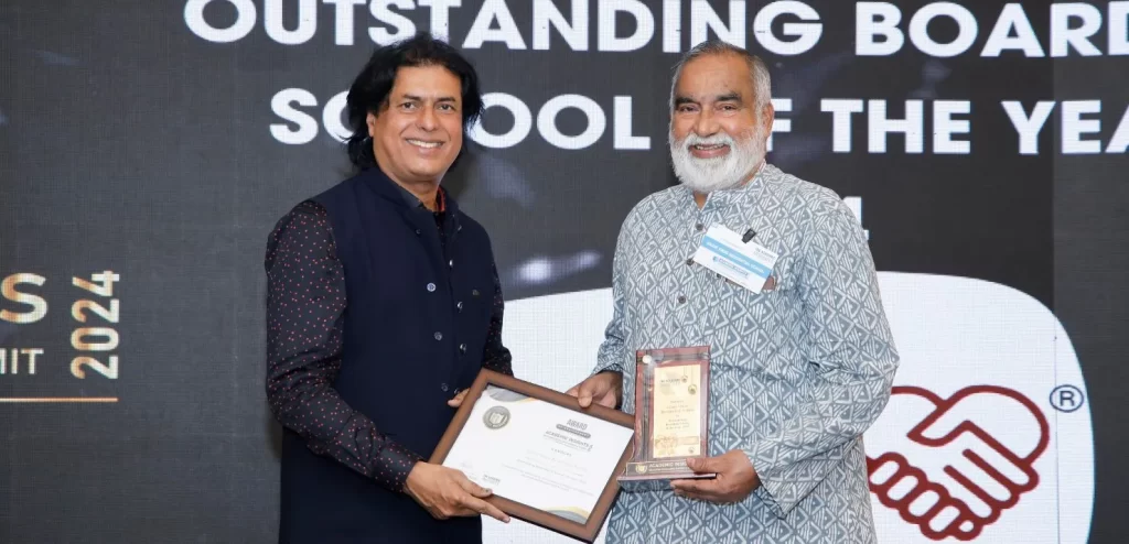 Joe Madiath, the Founder Chairman of Gram Vikas receiving the award at the Academic Insights Education Excellence Awards & Summit 2024