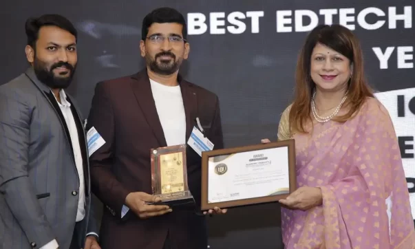 image of Sukumar Elangovan, Founder, and Gokul Kannan, Co-founder of Iguider Learning Private Limited receiving the award