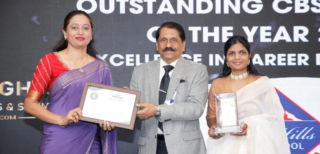 Ms. Shilpa Jagadish, the Center Head and Dorcus Preethi, the Principal of KMV Red Hills, receiving the award at the Academic Insights Education Excellence Awards & Summit 2024