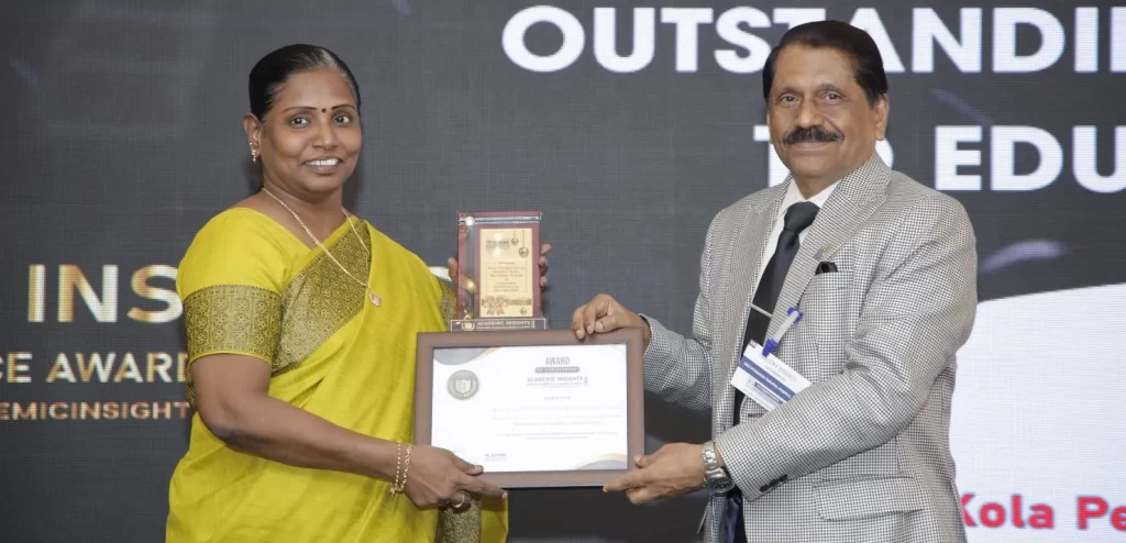 Smt. Silambuselvi, the Vice Principal of KPCVS receiving the award at the Academic Insights Education Excellence Awards & Summit 2024