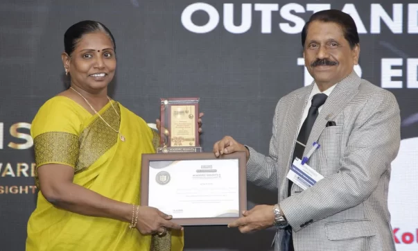 Smt. Silambuselvi, the Vice Principal of KPCVS receiving the award at the Academic Insights Education Excellence Awards & Summit 2024