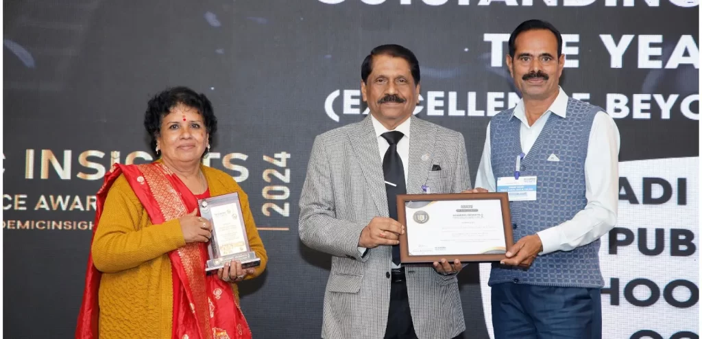 Mr. Vishnu Thorve, Committee Member of Kukadi Valley Public School and Jr. College, receiving the award presented at Academic Insights Education Excellence Awards and Summit 2024