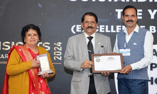Mr. Vishnu Thorve, Committee Member of Kukadi Valley Public School and Jr. College, receiving the award presented at Academic Insights Education Excellence Awards and Summit 2024
