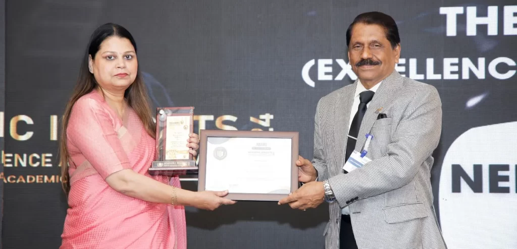 Mrs. Indu Dubey, Principal, receiving the ‘Outstanding School of the Year 2024’ award, from Col. Rajeev Mannali, the CEO of Sree Uthradom Thirunal (SUT) Hospital, Trivandrum, on behalf of the Academic Insights Magazine