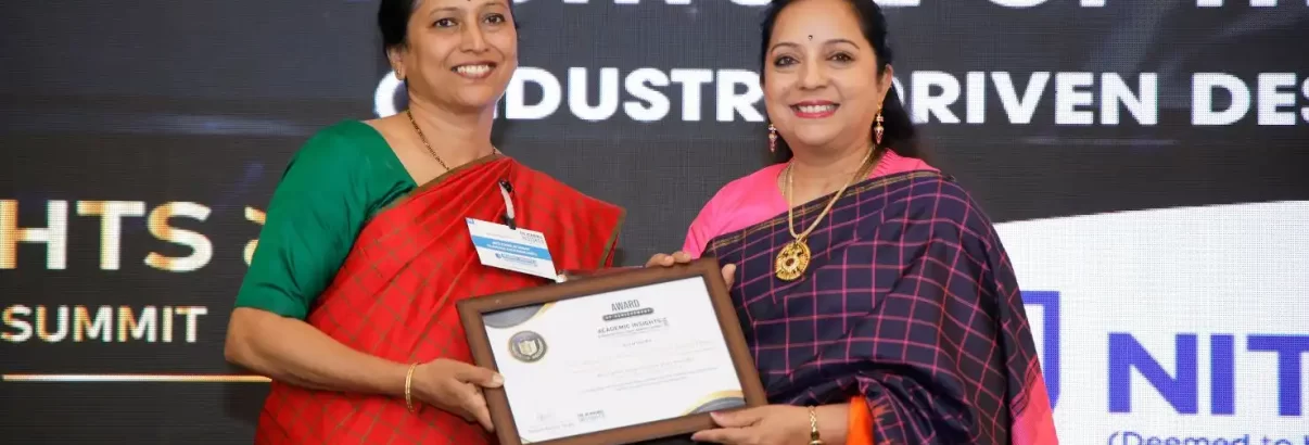 image ofDr. Sandhya Ravi, the Principal of NSFTID receiving the award
