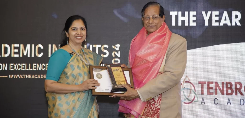 Ms. Renita M, the Principal of Tenbroeck Academy receiving award at the Academic Insights Education Excellence Awards & Summit 2024