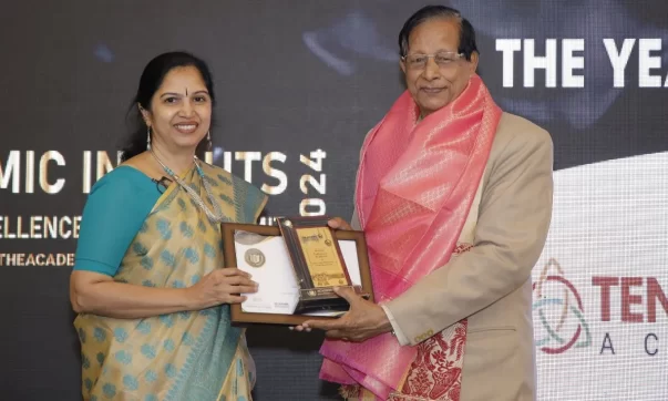 Ms. Renita M, the Principal of Tenbroeck Academy receiving award at the Academic Insights Education Excellence Awards & Summit 2024