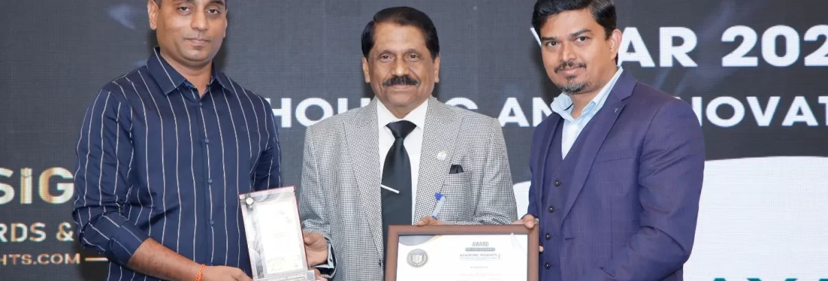 Venkat Raju, the President of Bagalur Cross Vinayaka Education Society, and Rasheed Mohammad, the Principal of Vinayaka Public School, receiving the award at the Academic Insights Education Excellence Awards & Summit 2024