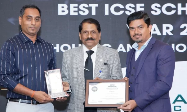 Venkat Raju, the President of Bagalur Cross Vinayaka Education Society, and Rasheed Mohammad, the Principal of Vinayaka Public School, receiving the award at the Academic Insights Education Excellence Awards & Summit 2024